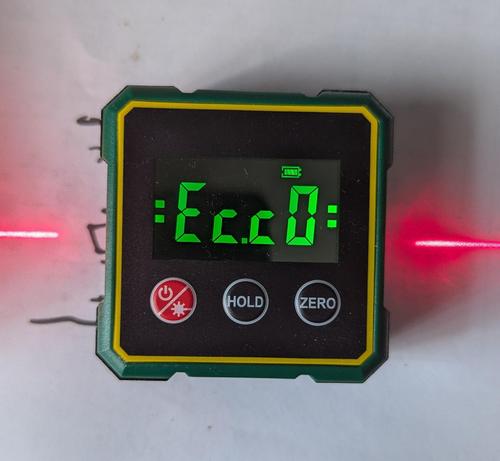 The device from the previous post now with the display reading, :ecc0: and laser light shining out of either side of it
